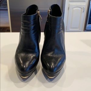 Vince Camuto. Black Leather boot/heels.